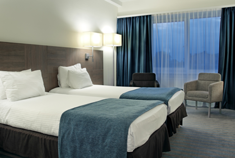 A hotel room that has been cleaned with an eco-friendly disinfectant.